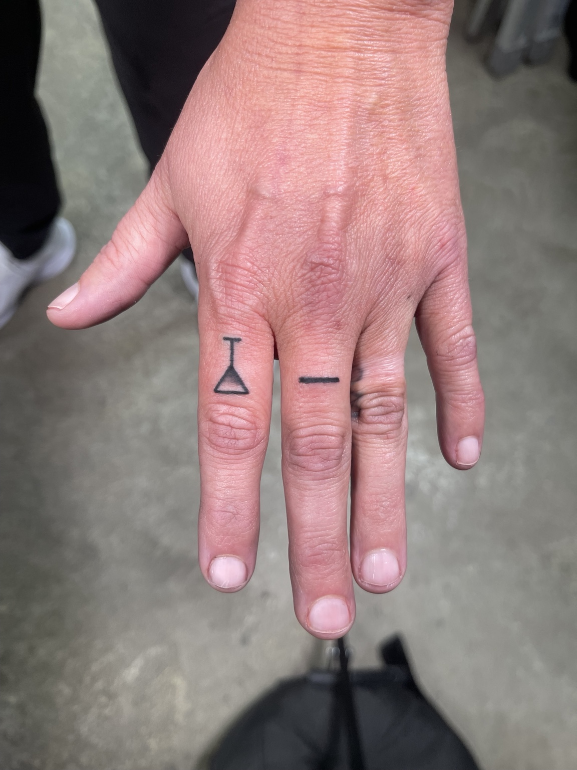 Small finger symbols tattoo