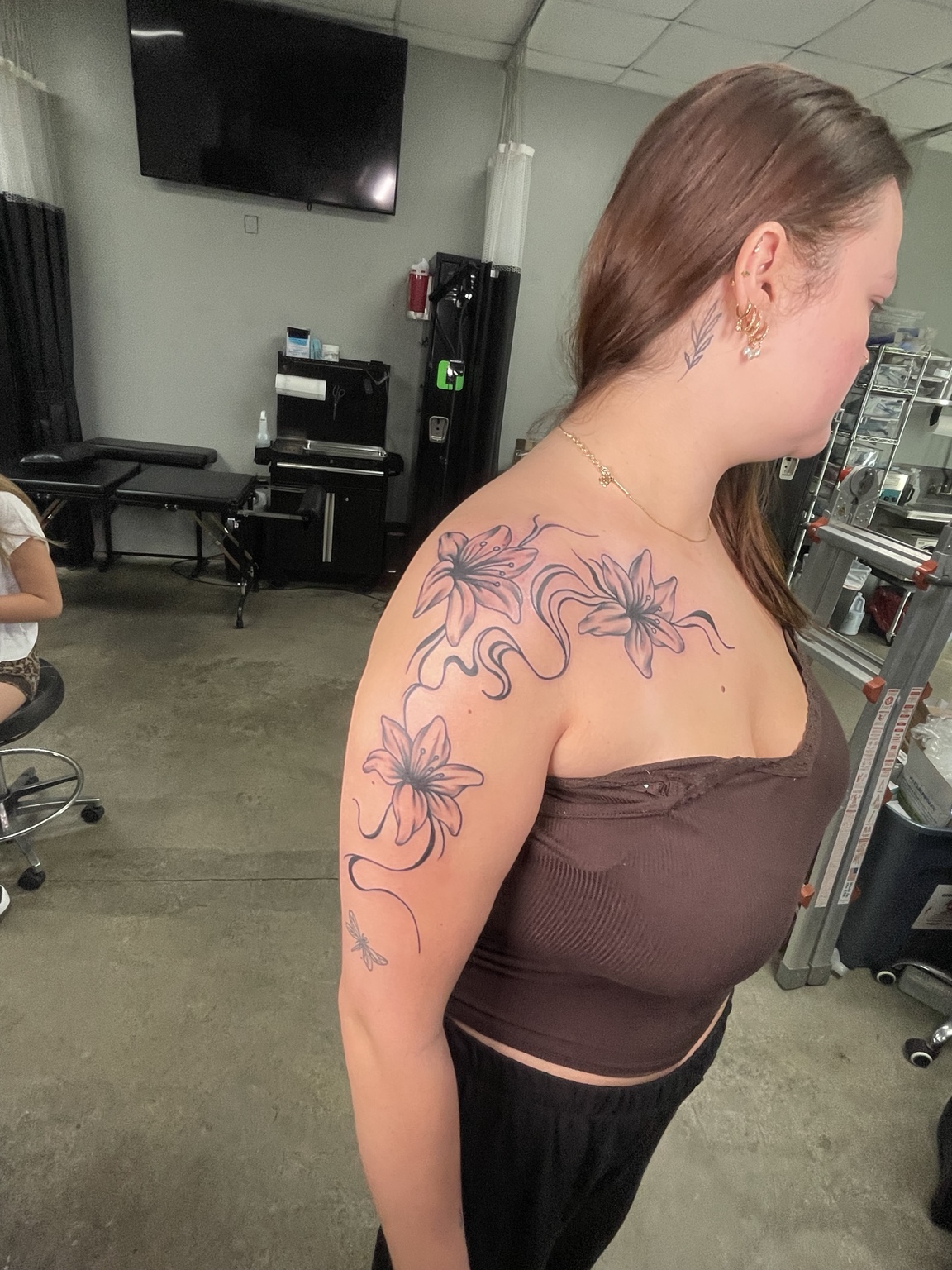 Floral shoulder tattoo full side view