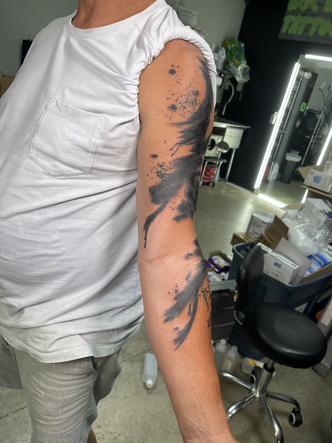 Abstract brushwork arm tattoo third view