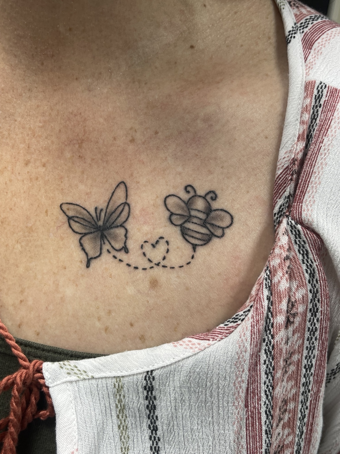 Two small floral tattoos
