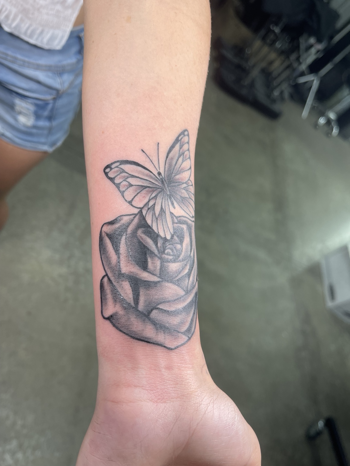 Rose hand tattoo second view