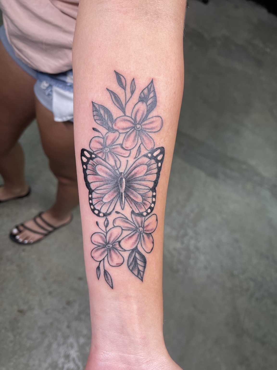 Floral forearm tattoo