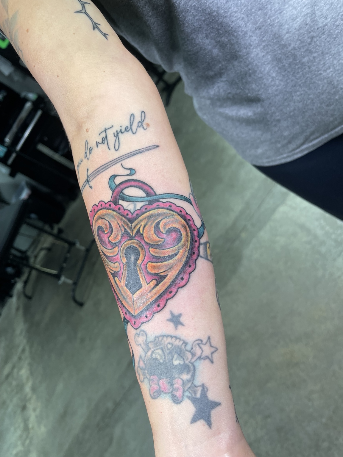 Heart forearm tattoo alternate view