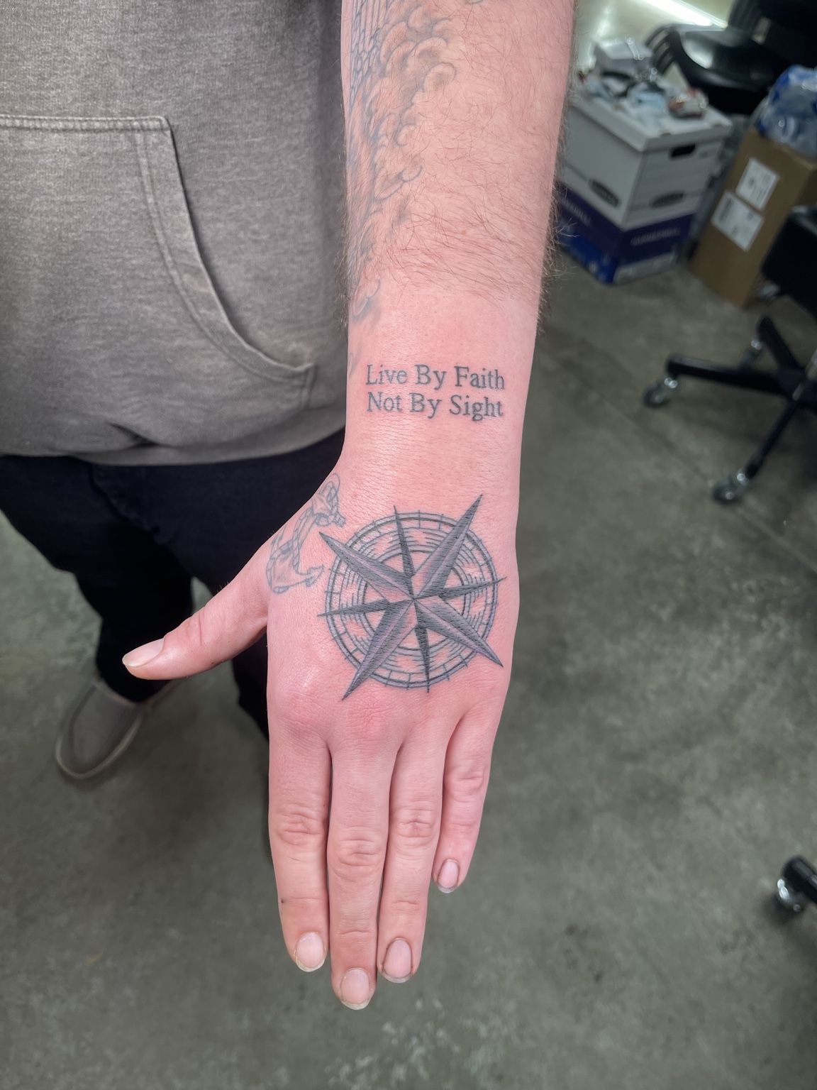 Compass hand tattoo