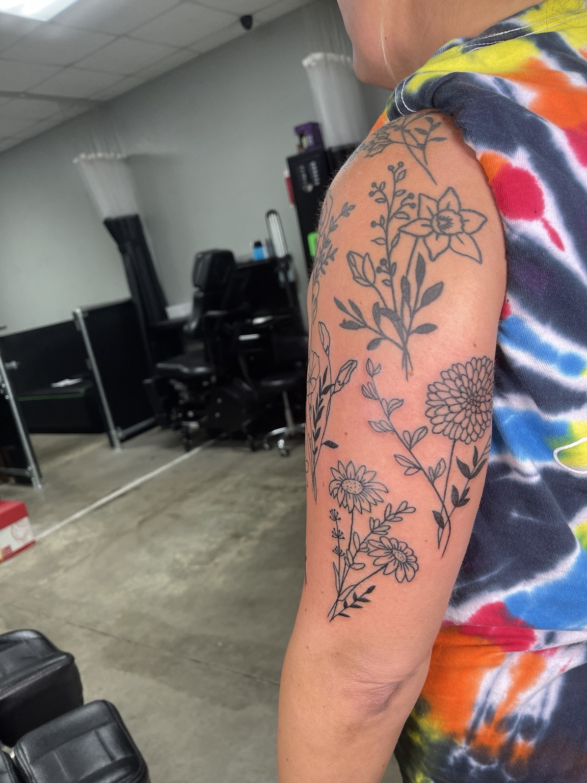 Floral upper arm tattoo alternate view