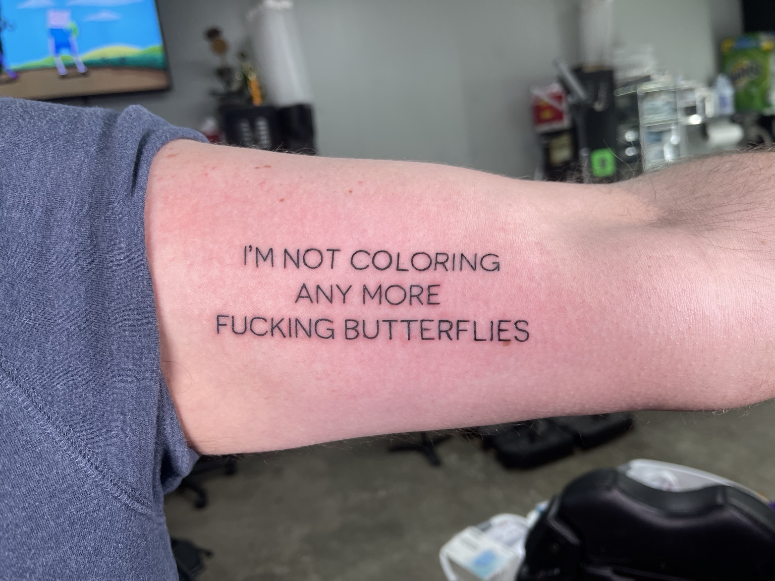Humorous text tattoo