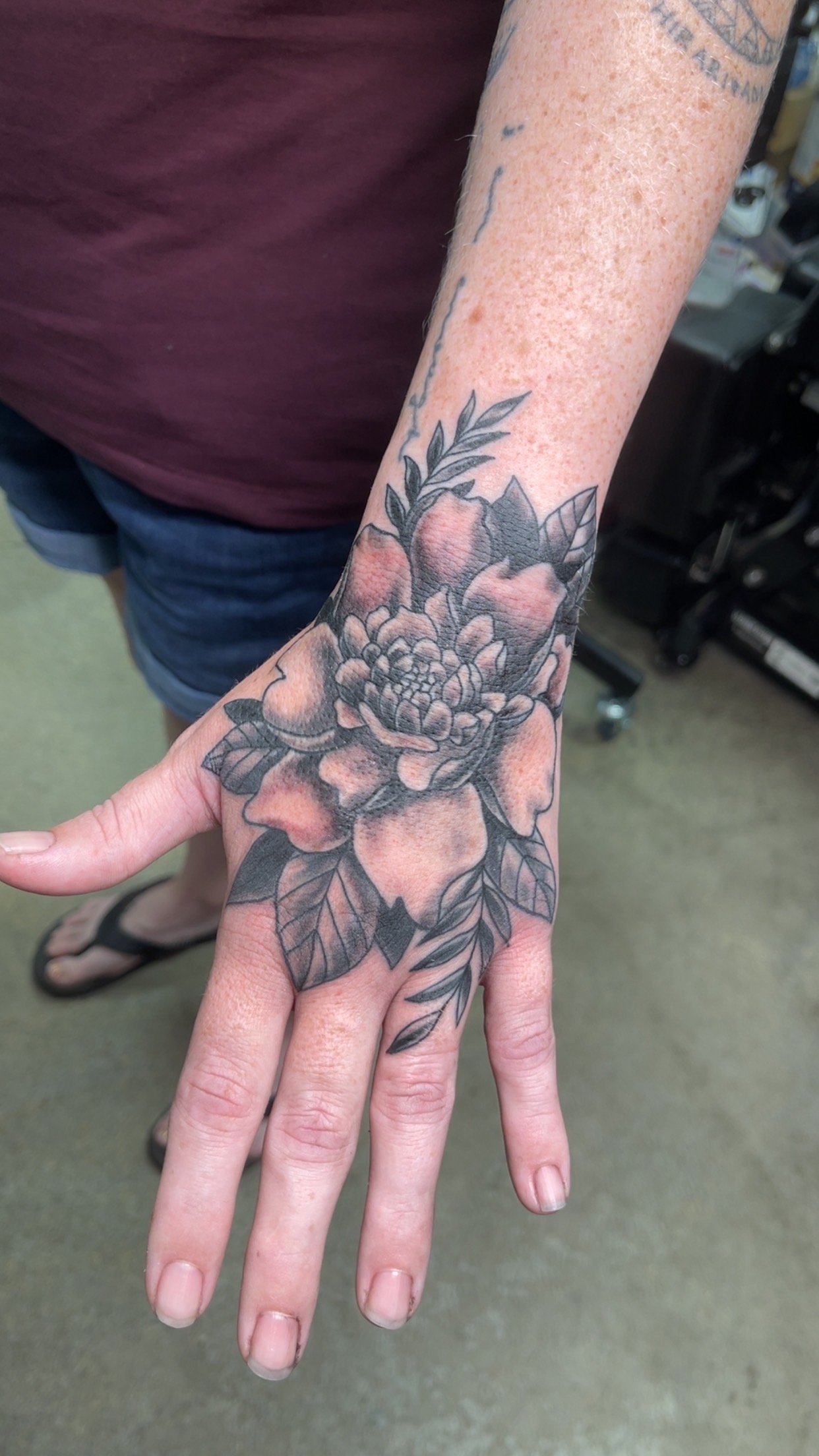 Floral hand tattoo first view