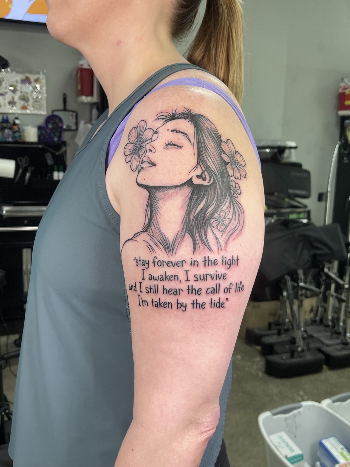 Portrait memorial upper arm tattoo