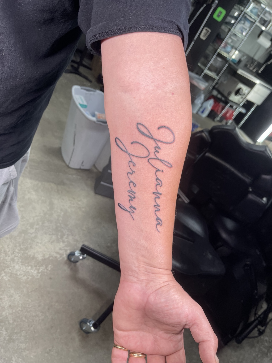 Script forearm tattoo