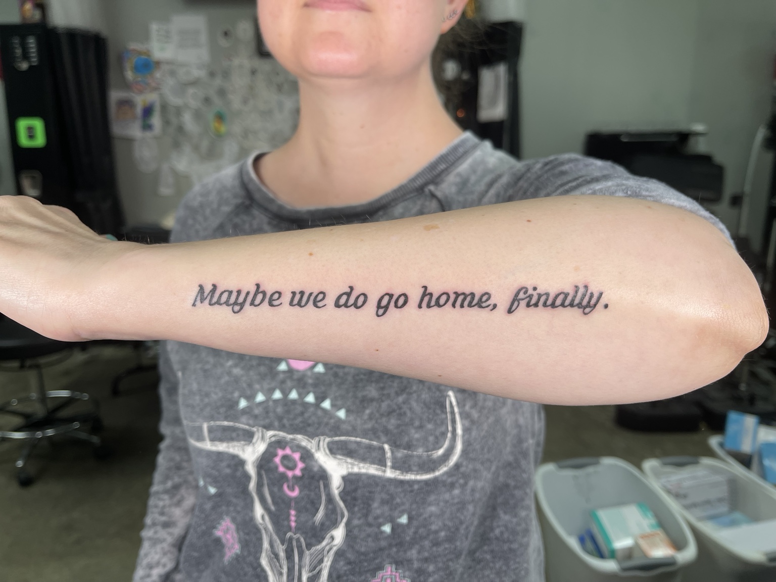 Script inner arm tattoo