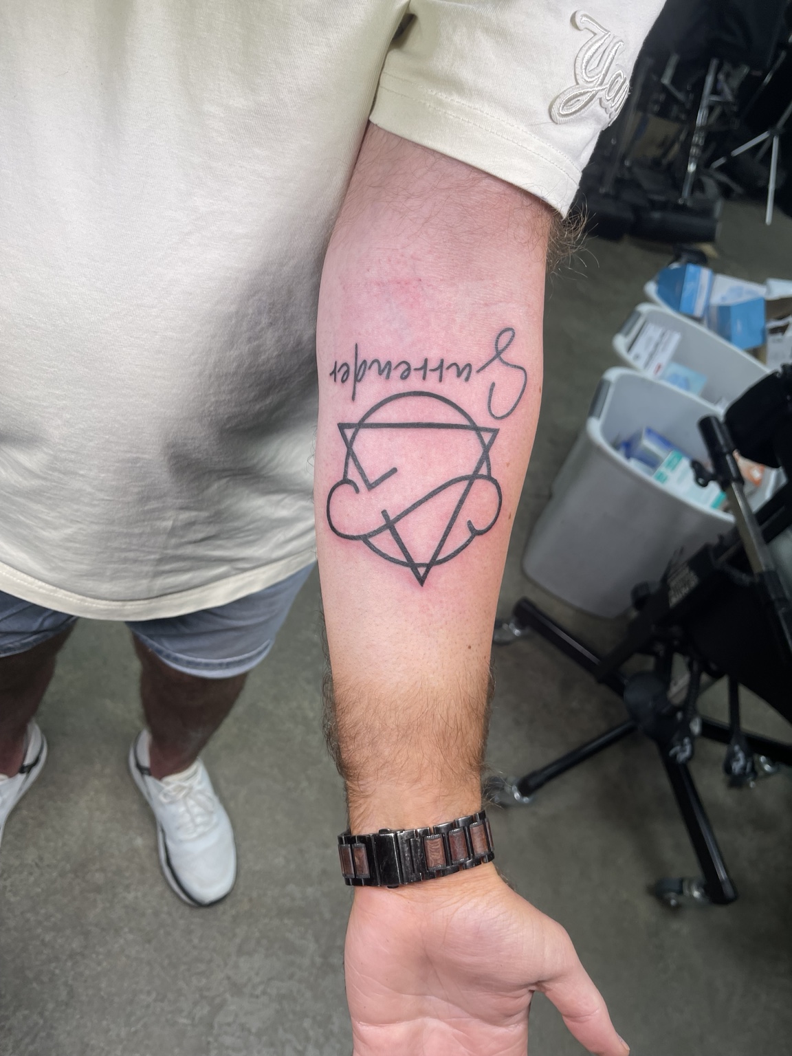 Simple diamond style forearm outline tattoo