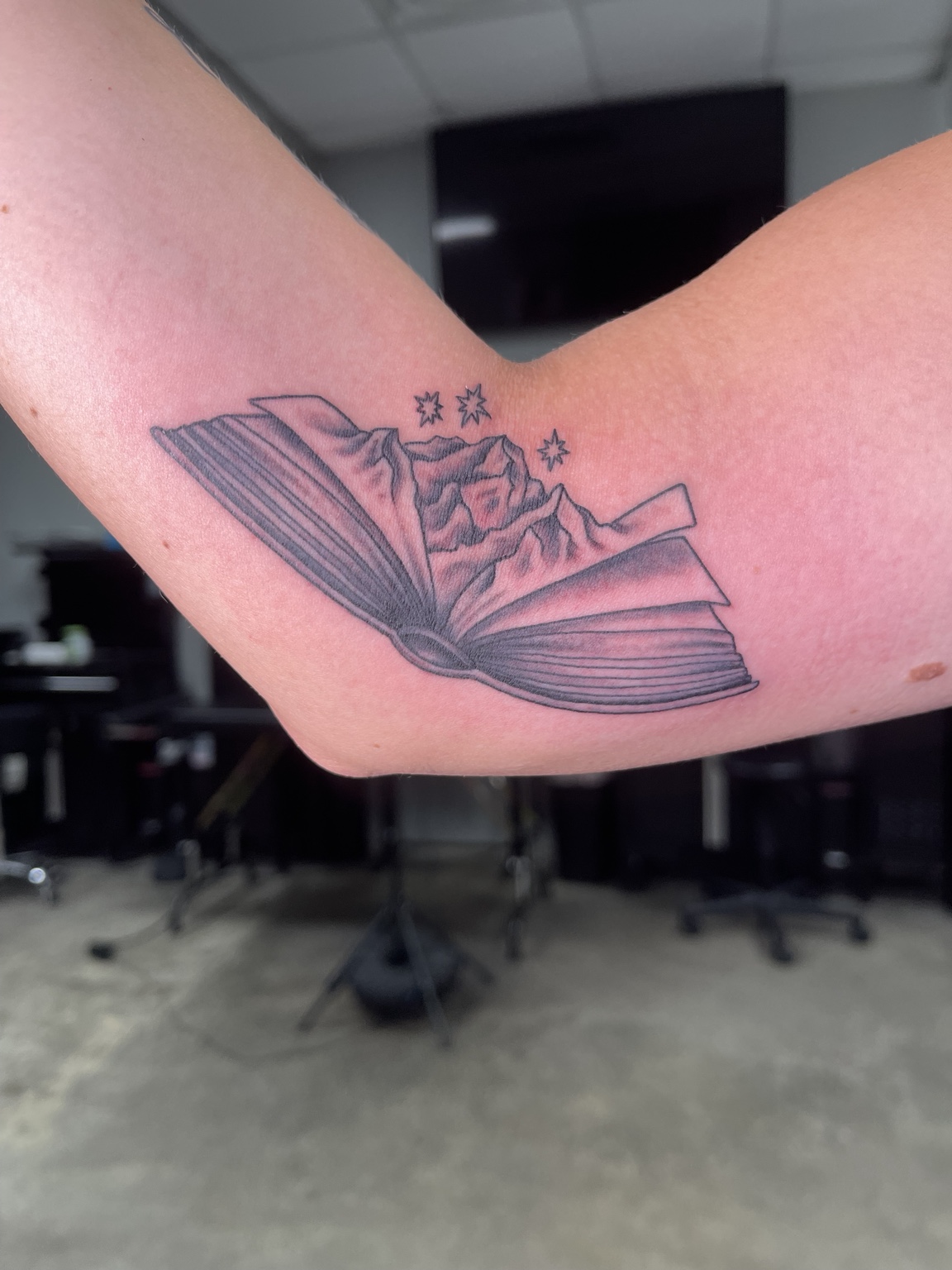 Open book tattoo first view