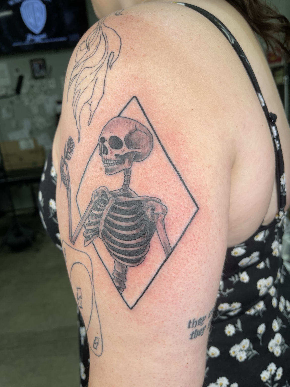 Skeleton upper arm tattoo alternate view