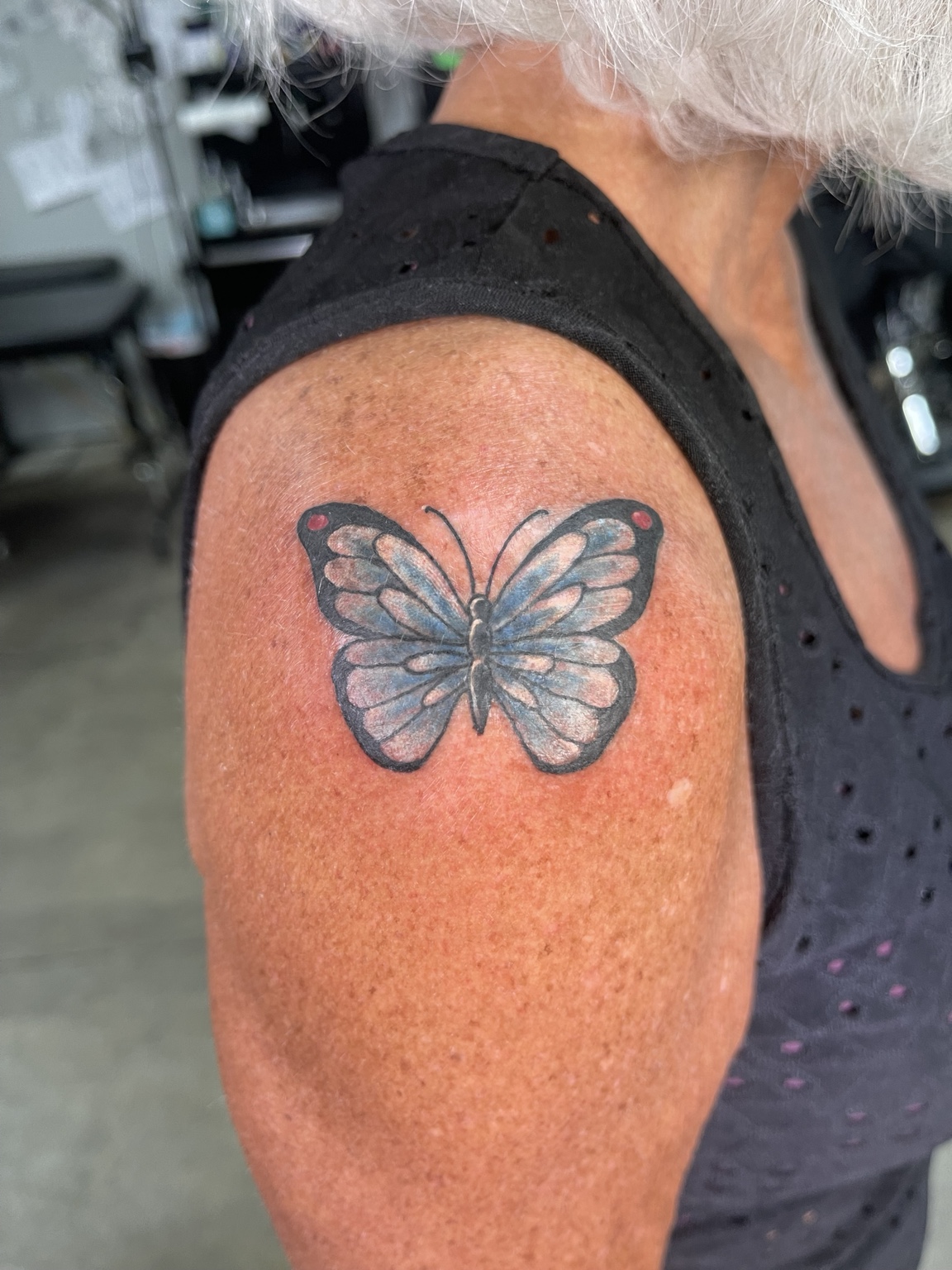 Butterfly shoulder tattoo