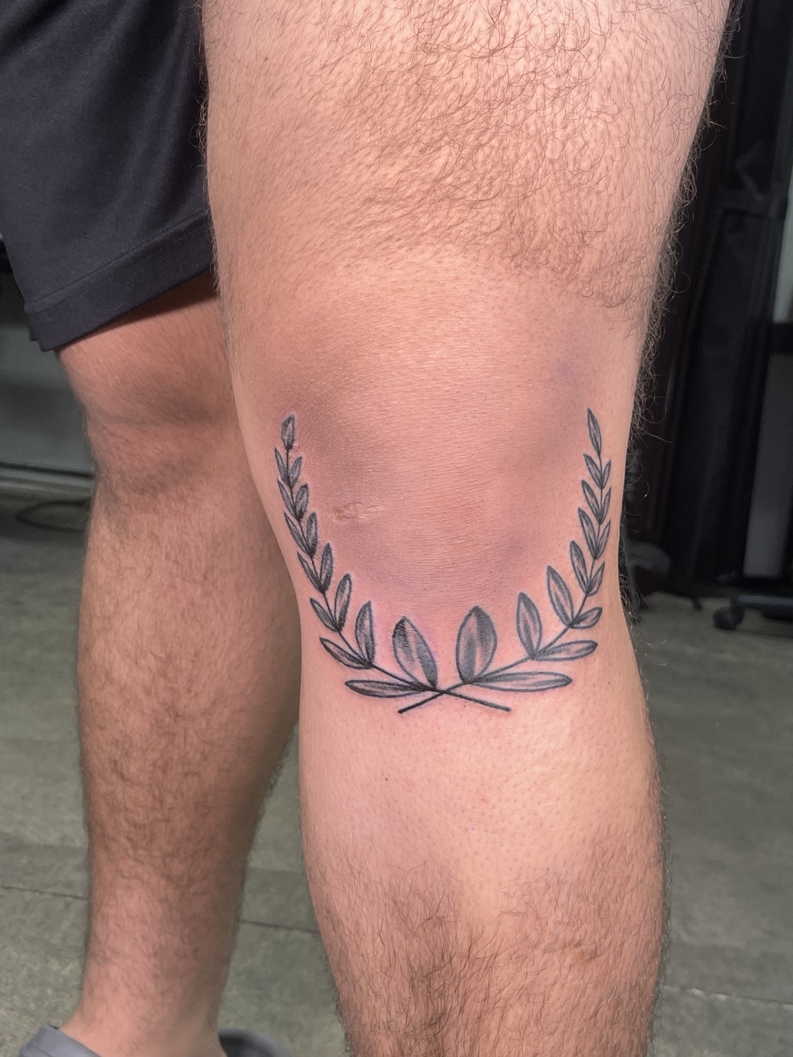 Laurel knee tattoo
