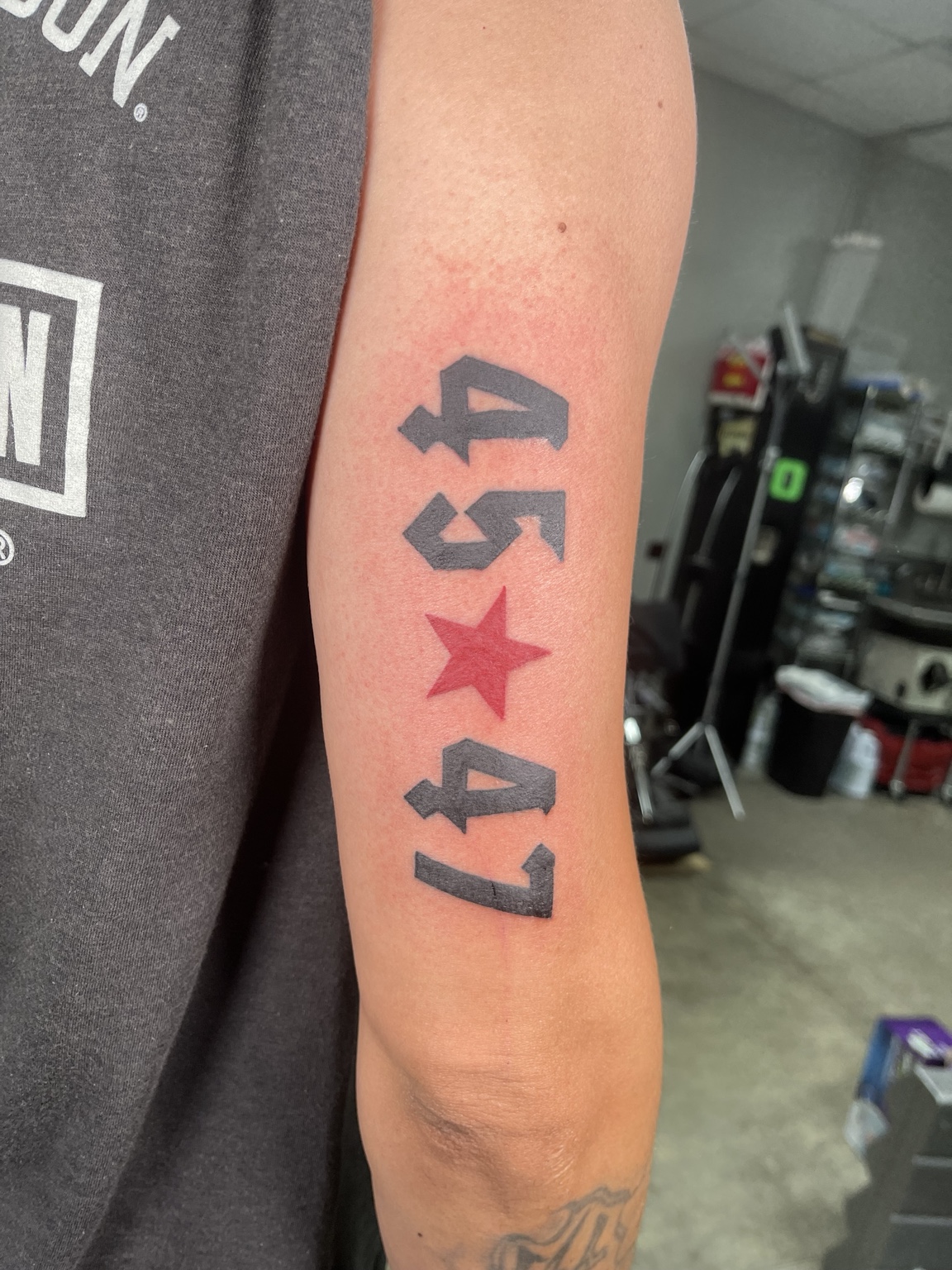 Number and star tattoo