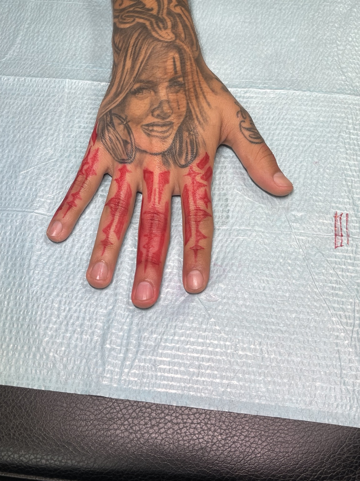 Hand tattoo detail view