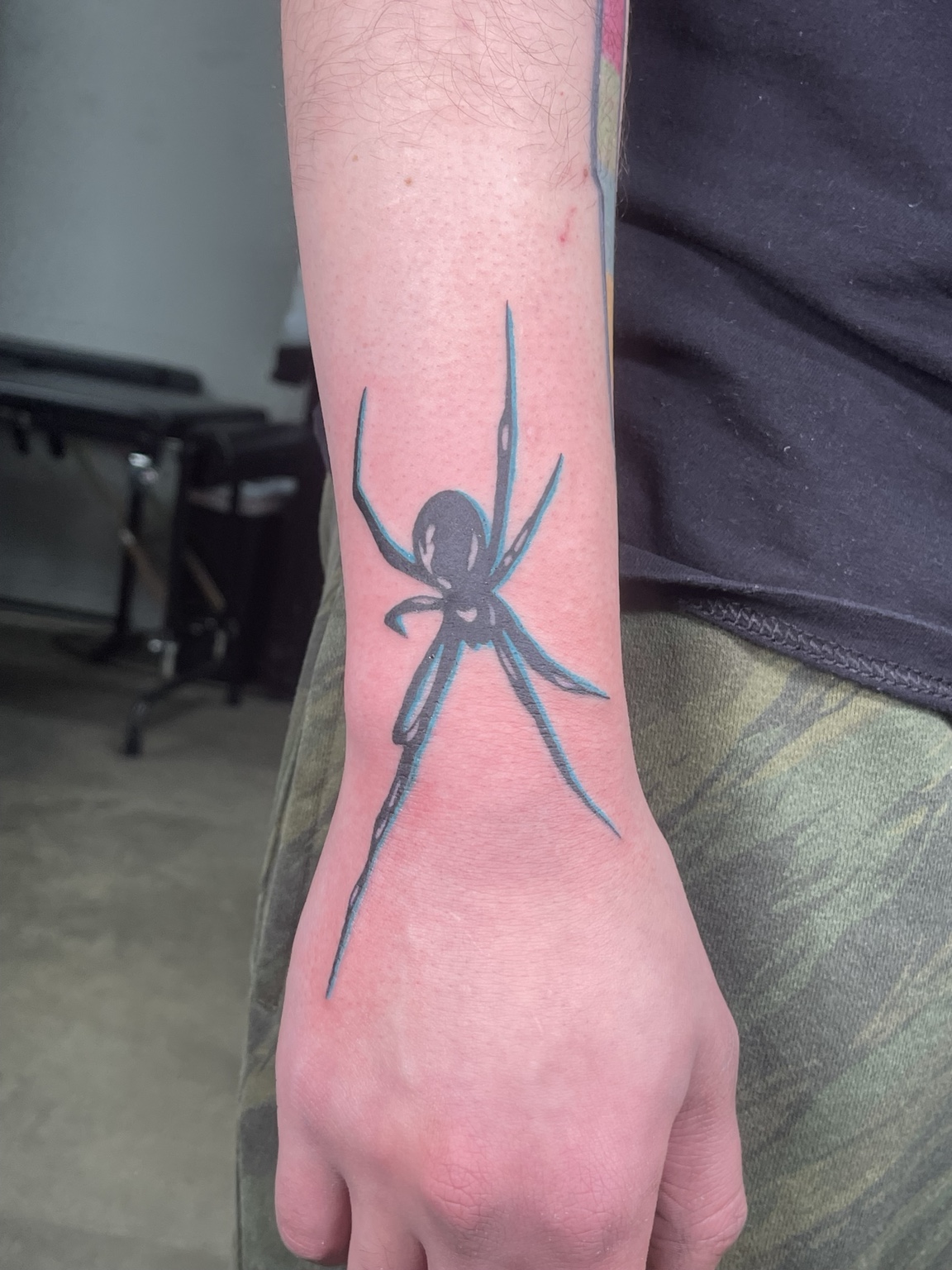 Spider hand tattoo