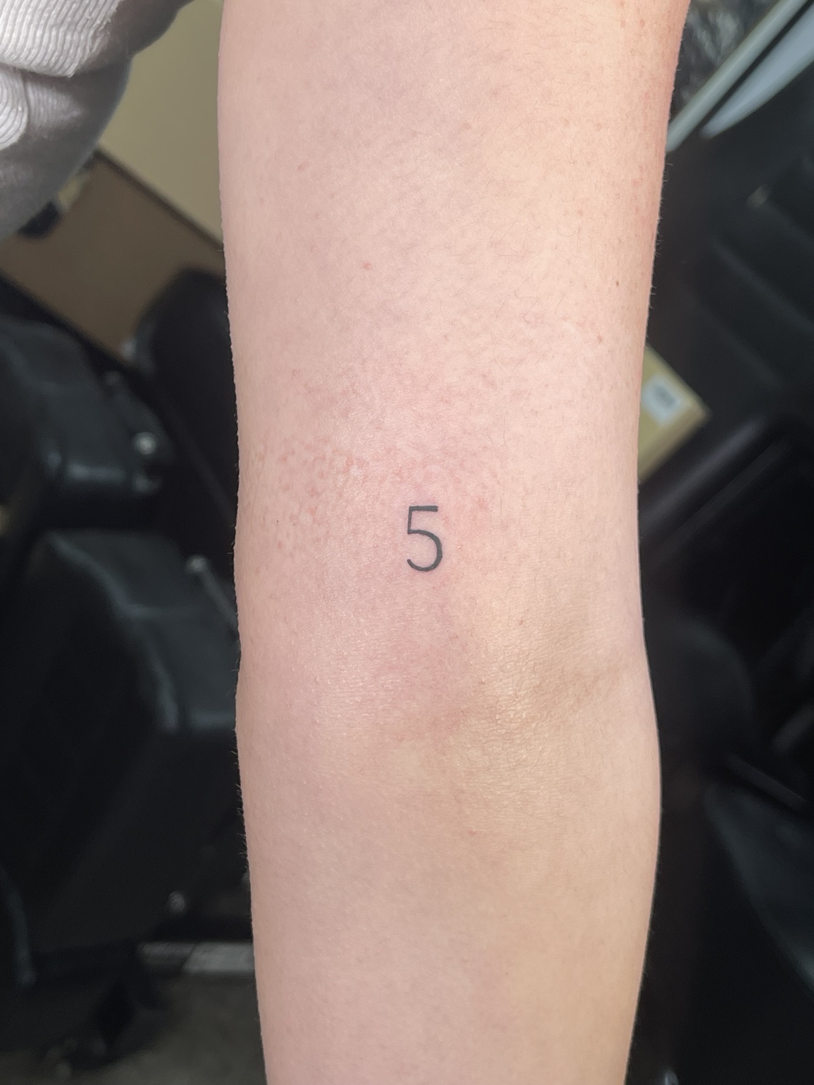 Small matching number five tattoo